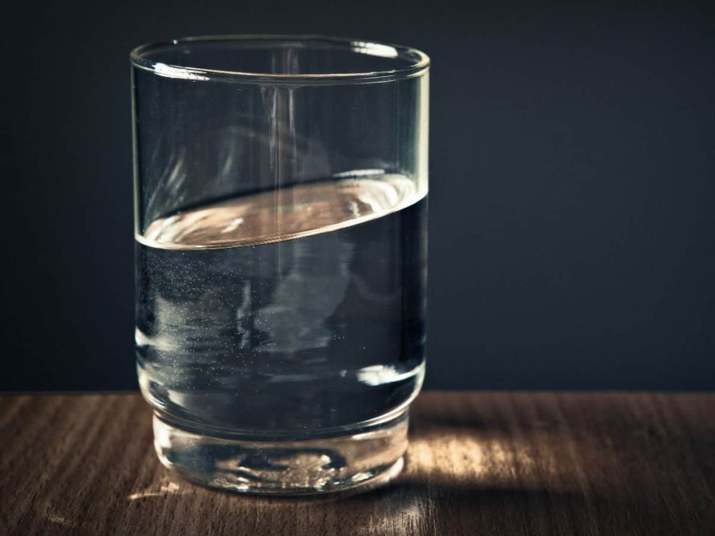 close up of water glass, lopsided towards right side